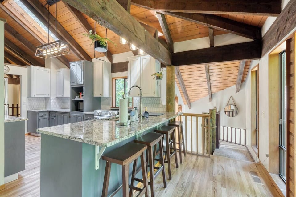 Pull up a seat. With three comfy bar stools and a spacious counter, this is the perfect spot for morning coffee, casual meals, or keeping the cook company.