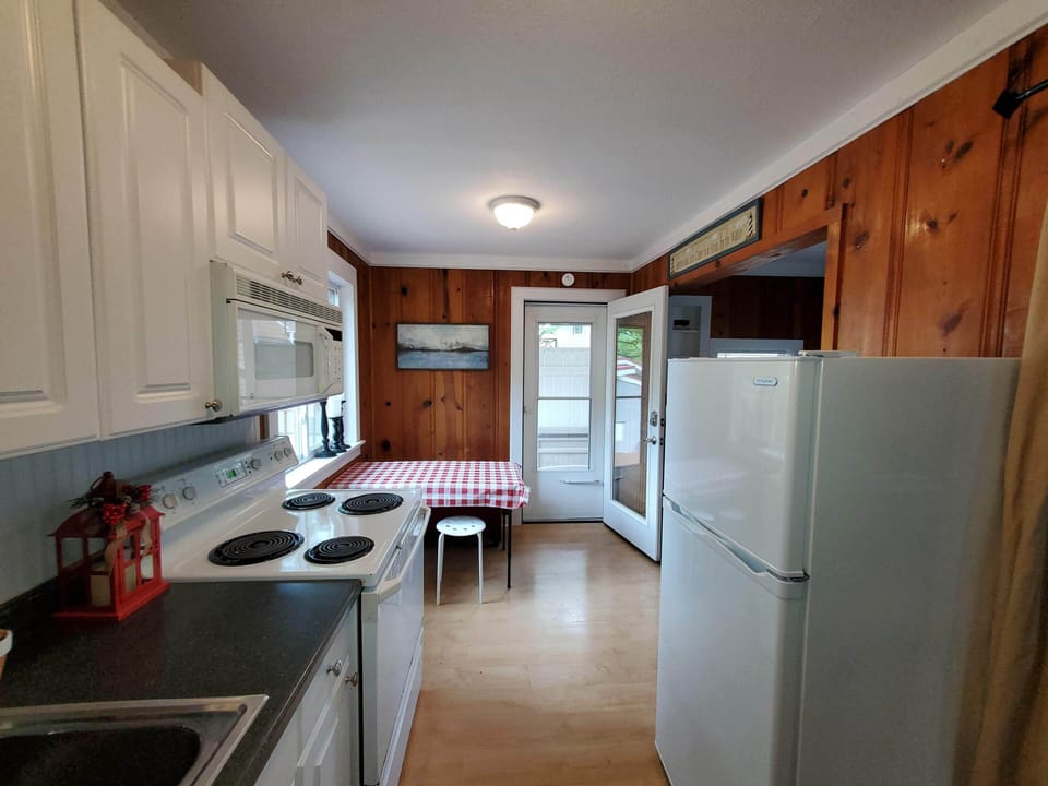 KITCHEN LOOKING INTO DINING ROOM