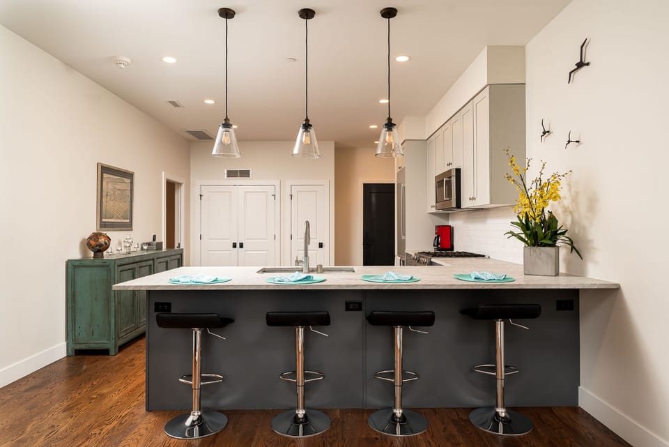 Four seats at the kitchen island.