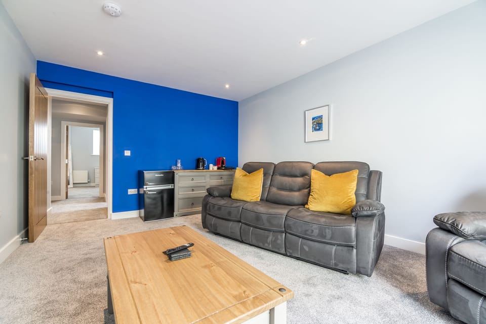Apartment (1 Bedroom) | Living area | Flat-screen TV