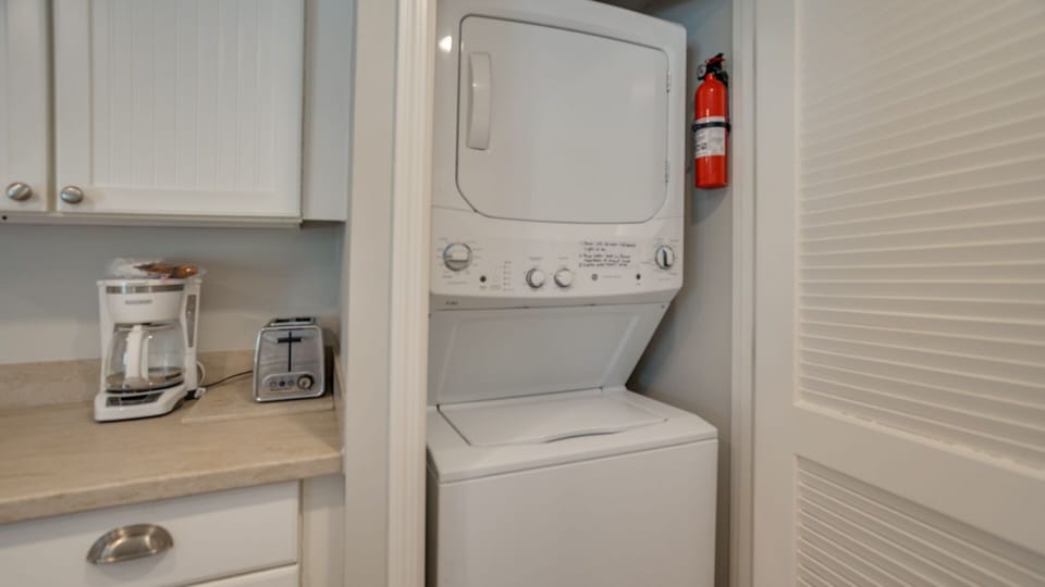 This home includes a dedicated laundry area equipped with  washer and dryer units.