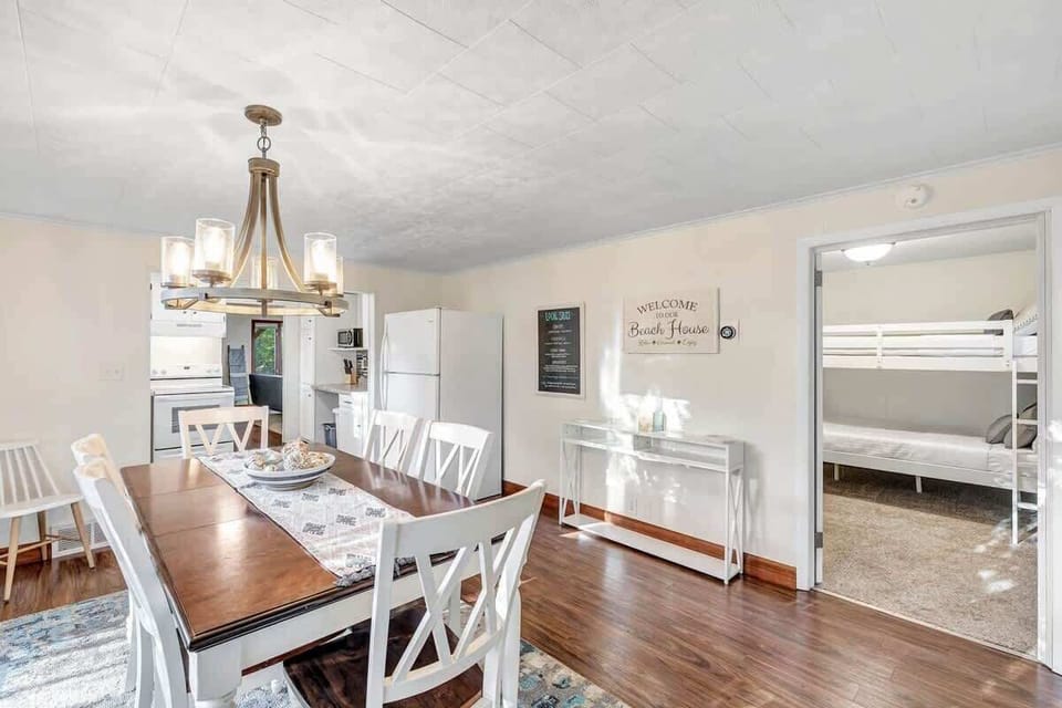 Dining Room: Bright dining area with modern decor, perfect for family meals and laughter!


