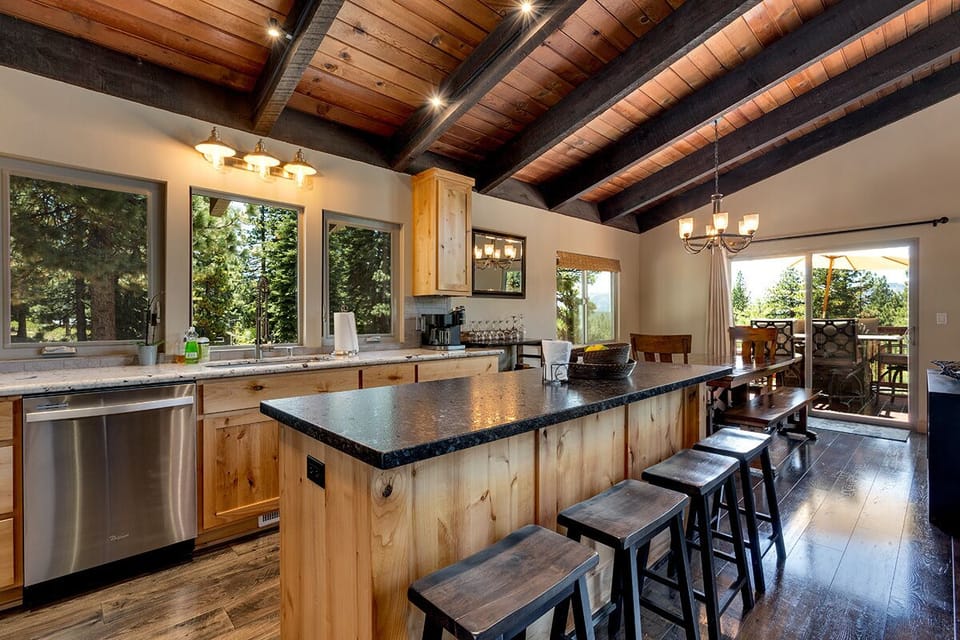 The fully equipped kitchen features a large island, perfect for meal prep.