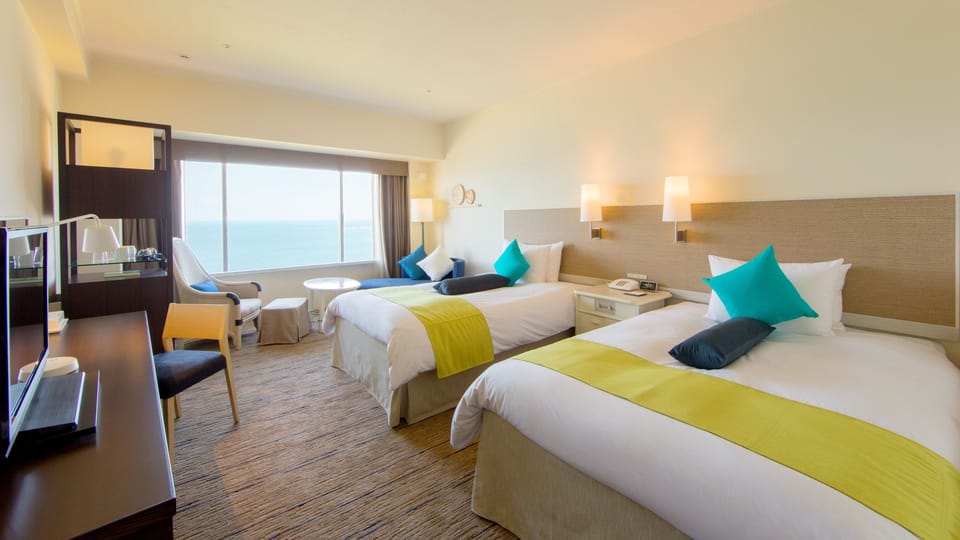Standard Room, 2 Twin Beds, Ocean View | In-room safe, desk, laptop workspace, blackout drapes