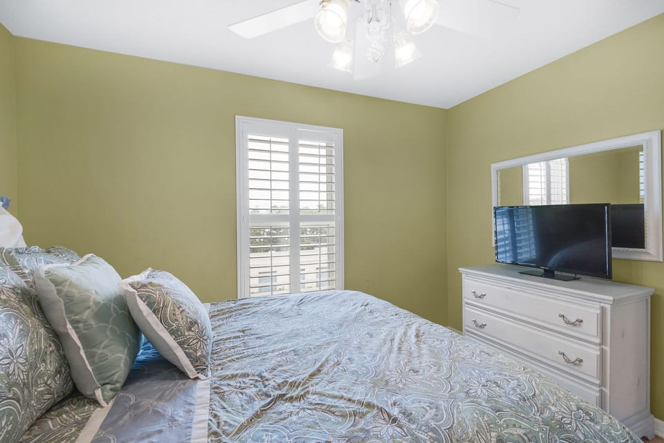Guest bedroom with flat screen TV