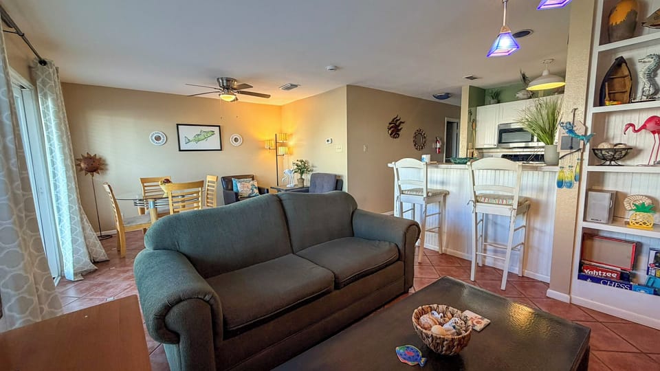 Living space with relaxed seating for the family and a full size sofa bed and twin size fold-out sleeper chair.