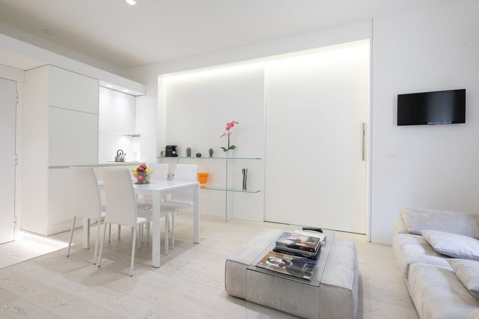 Deluxe Apartment | Living area | Flat-screen TV