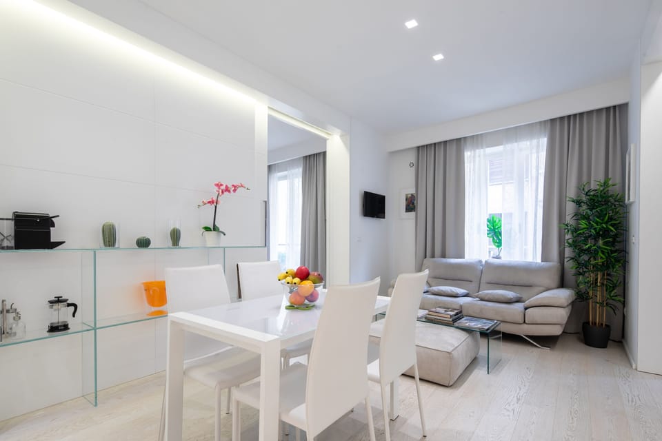 Deluxe Apartment | Living area | Flat-screen TV