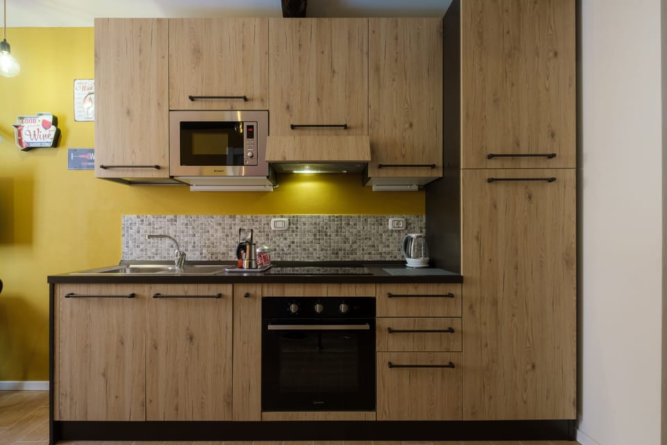 Apartment, 1 Bedroom | Private kitchenette | Full-size fridge, microwave, oven, stovetop