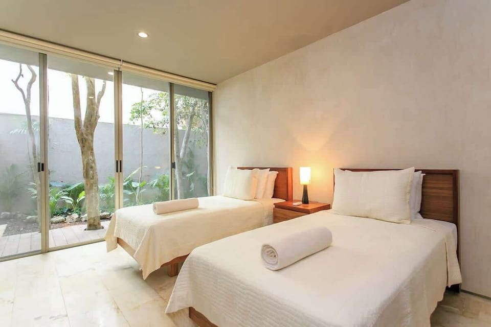 Bedroom 2: 2 twin beds that can be pushed together if needed