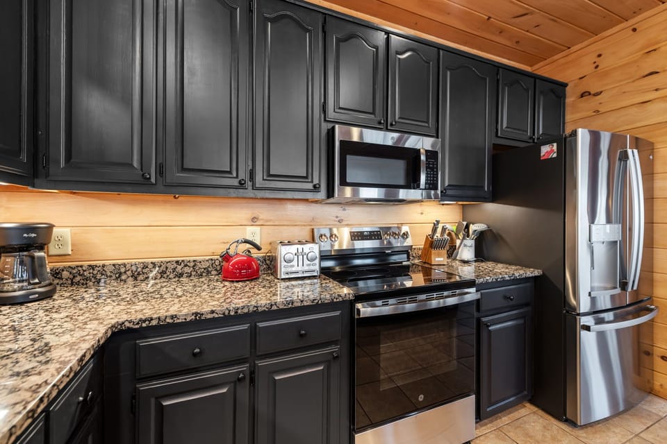 Beautiful kitchen with plenty of space to cook and gather. 