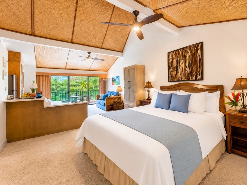 Bright King Suite with bamboo ceilings, A/C, and tropical lanai views