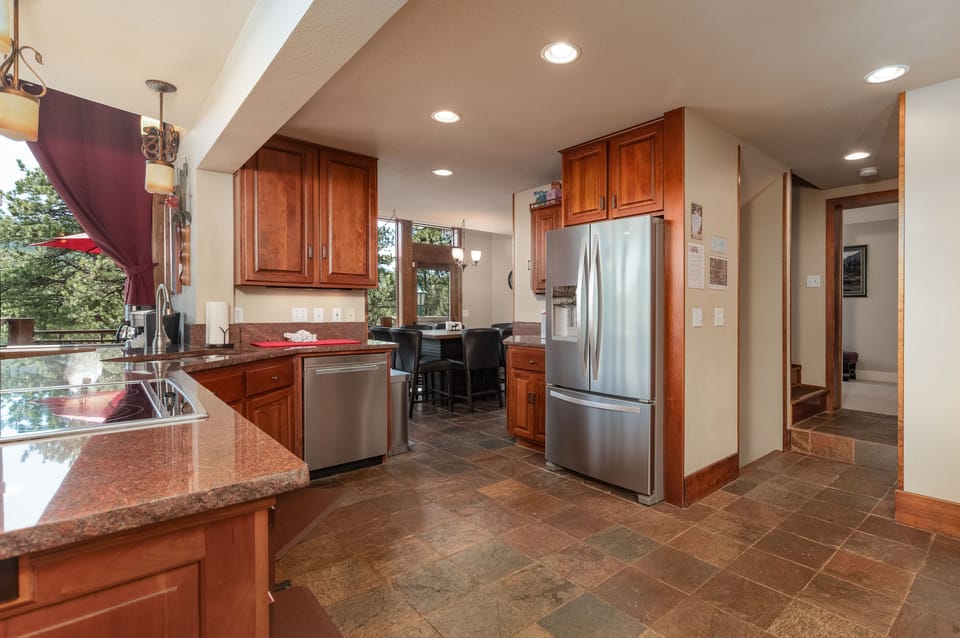 Open kitchen, lots of room, and entrance to the breakfast/gameroom nook