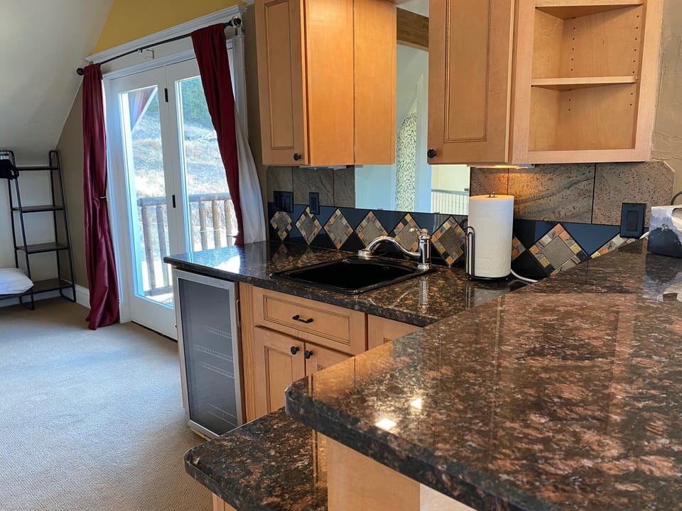 1st bedroom- king suite with wet barand gas fireplace