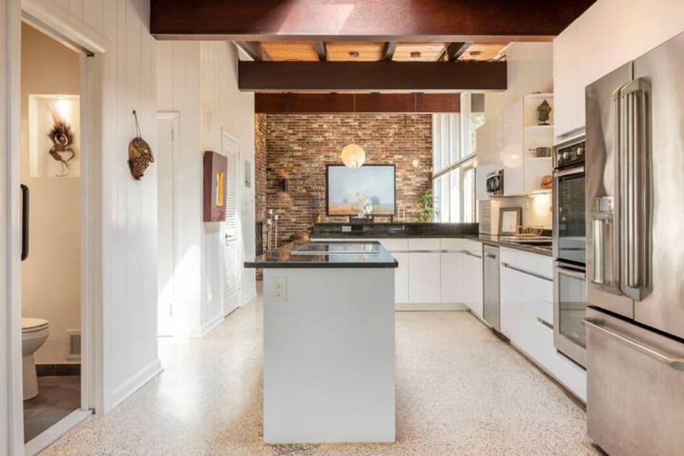 Kitchen looking on from the family room towards the formal dining room