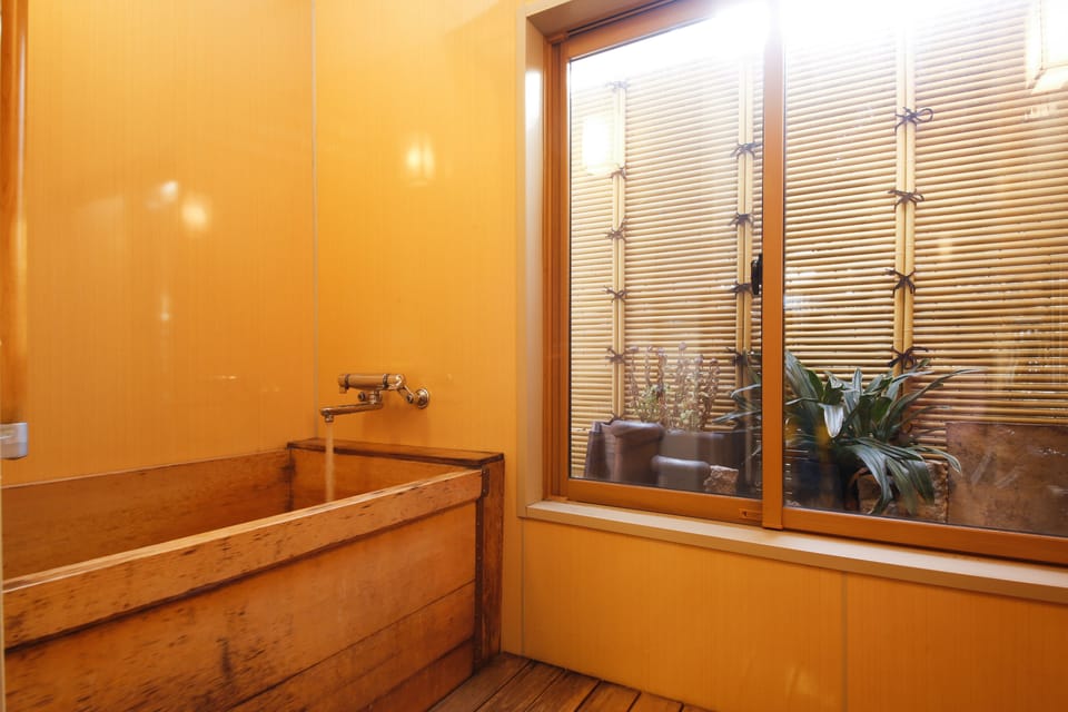 Japanese Style Room, Private Bath (hinoki) | Bathroom | Combined shower/tub, free toiletries, hair dryer, slippers