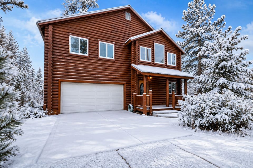 Snow covered Big Bear Cool Cabins Bear Bait, front