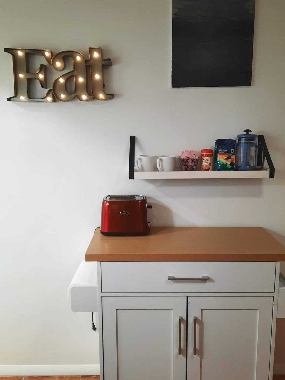 Breakfast nook with movable cart and coffee station
