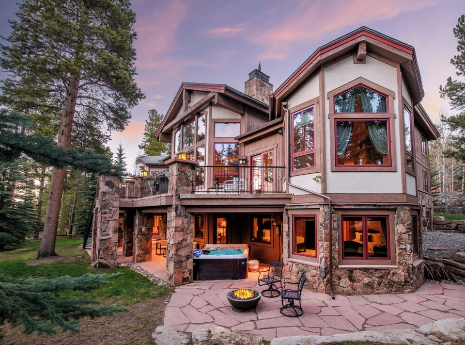 Hot tub and fire pit on the patio.