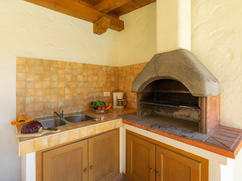 Building, Cabinetry, Property, Kitchen Sink, Countertop, Wood, Kitchen Appliance, Sink, Interior Design, Lighting
