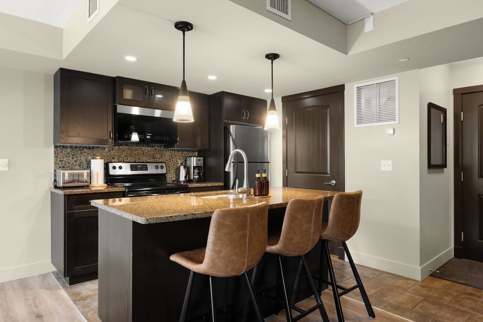 Spacious kitchen stocked with everything you need for a convenient stay.