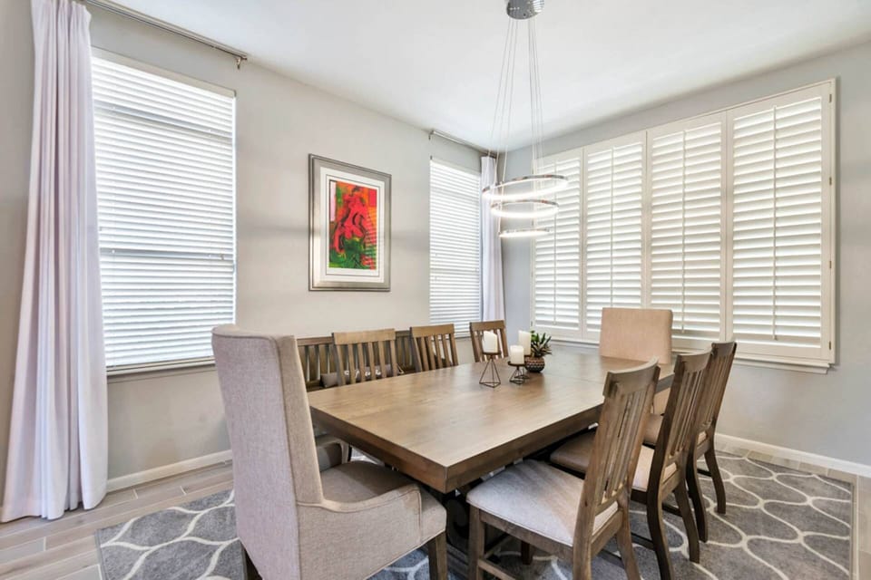 Beautiful dining room just off the kitchen seating for 8+