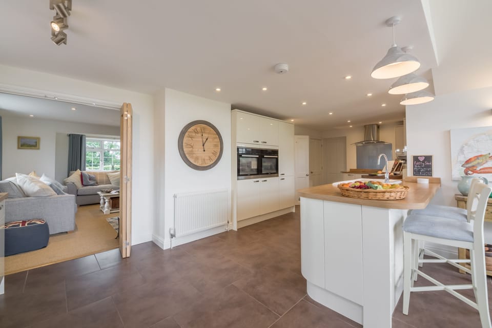 Ground floor: Kitchen with view to sitting room