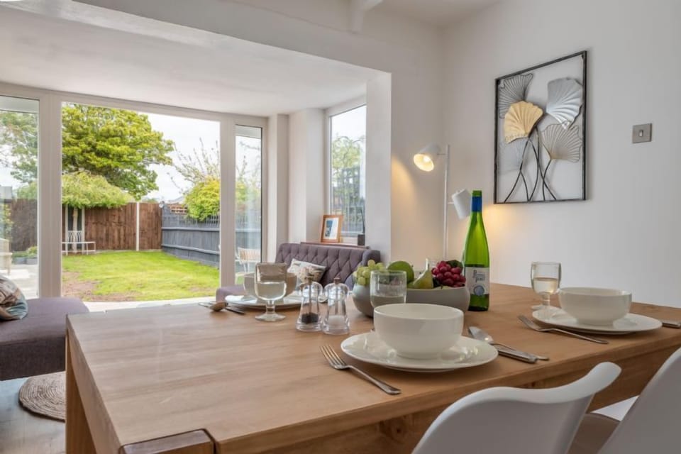 Ground floor: Dining room with french doors leading into the garden