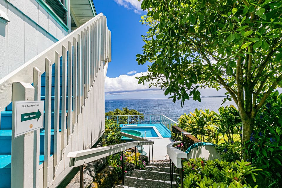 Follow the landscaped path of steps to all four guest rooms.