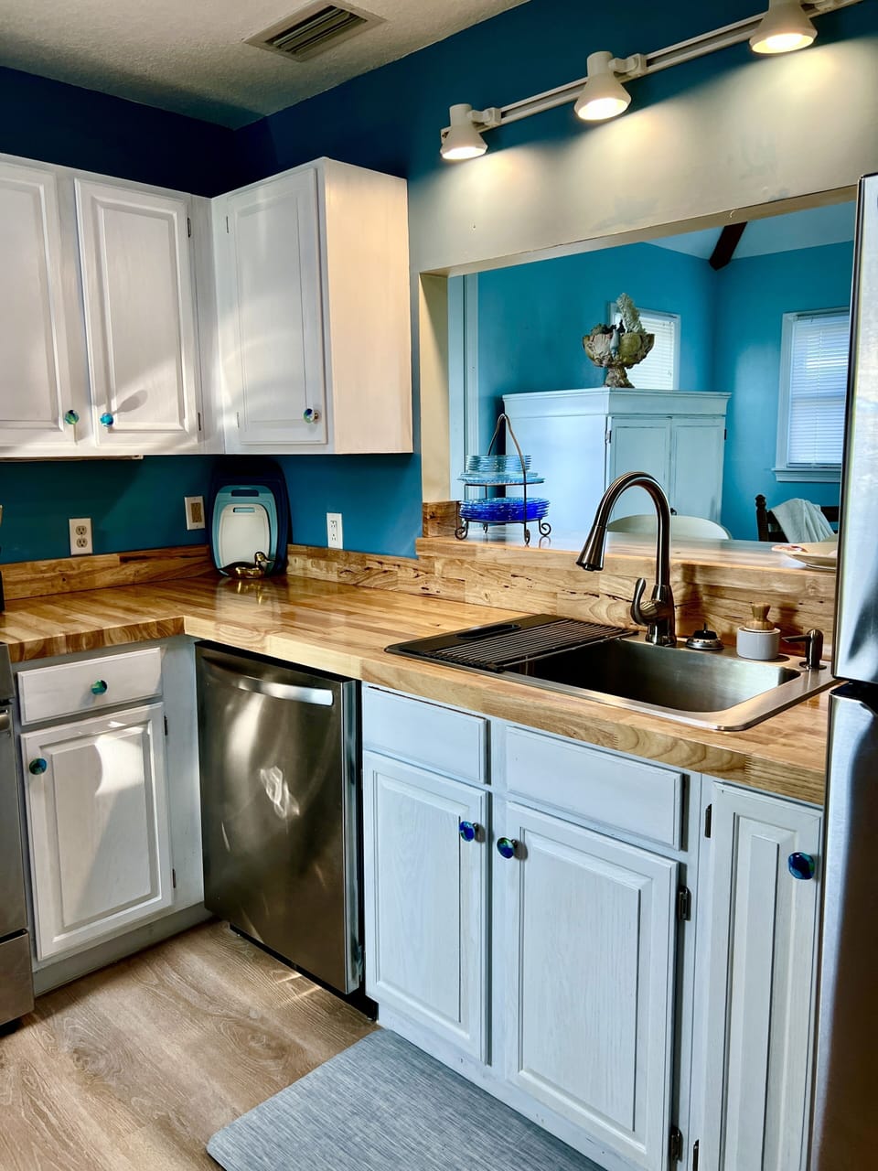 Newly remodeled w brand new refrigerator, stove, dishwasher, sink and pass thru