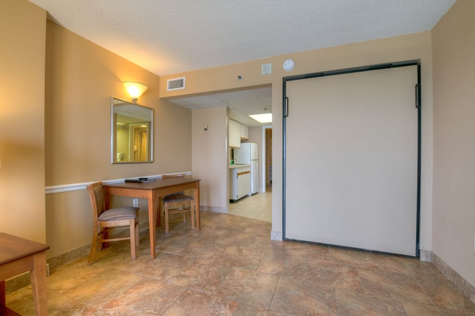 Suite, Oceanfront | In-room safe, blackout drapes, iron/ironing board, bed sheets
