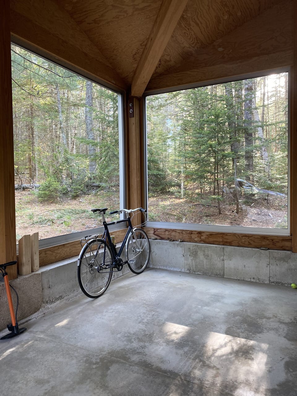 Large garage holds one large car or two smaller ones. Has two very large windows