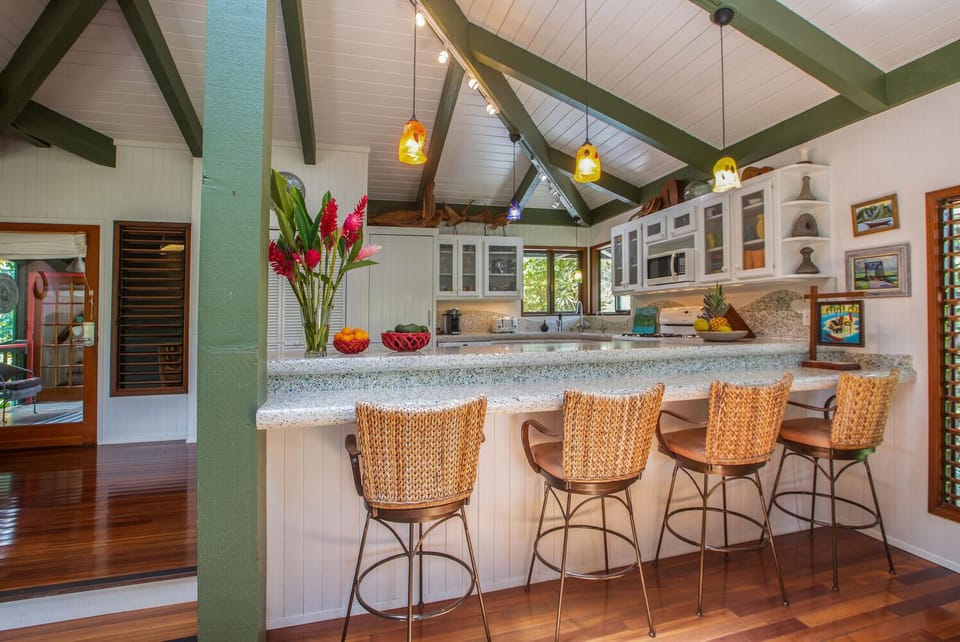 Enjoy watching the cook from the kitchen bar