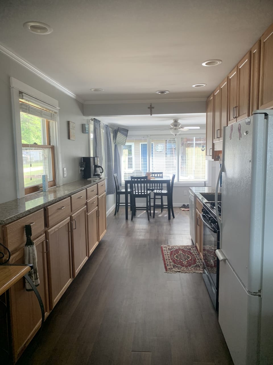 Galley kitchen with eat in dining