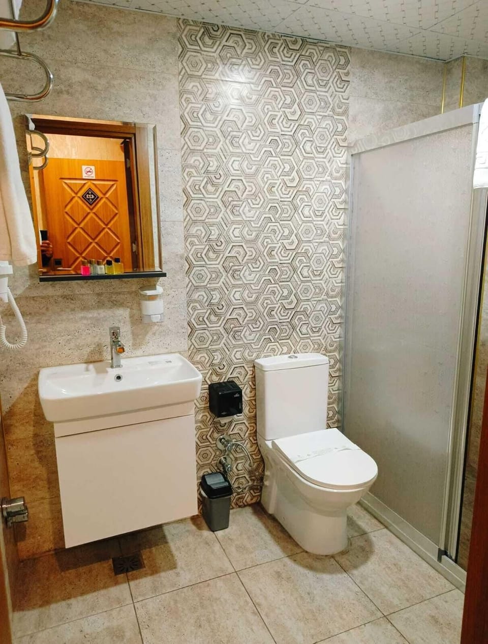 Shower, free toiletries, hair dryer, slippers