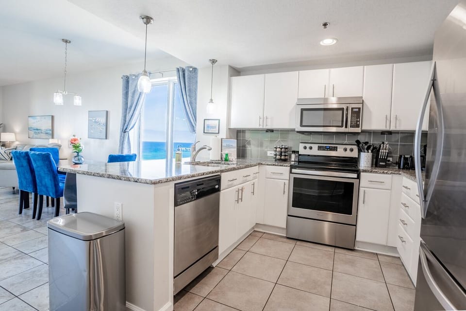 Fully stocked kitchen, corner unit provides gulf views