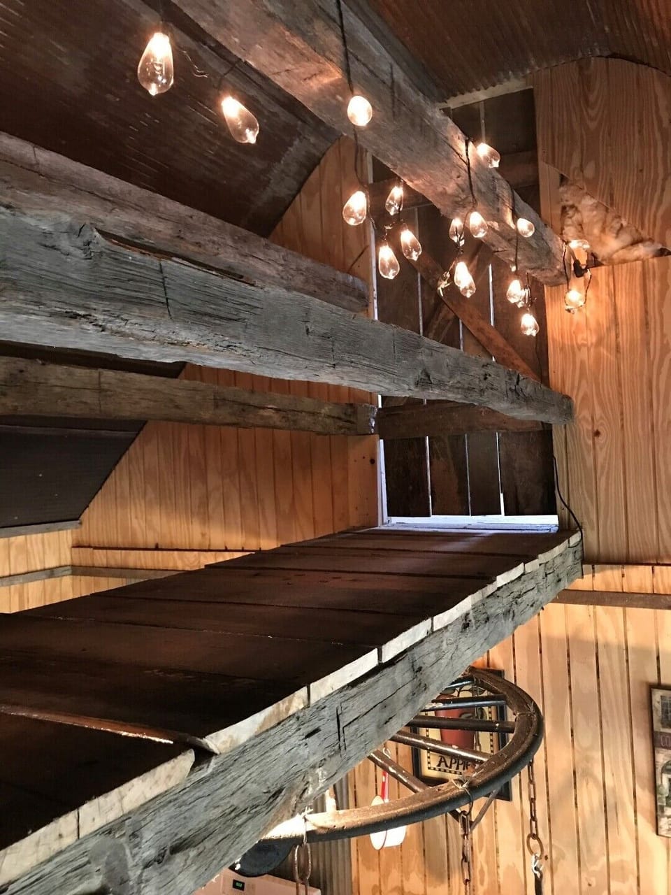 The catwalk between the upstairs bedrooms is made from hand hewn old barn beams.