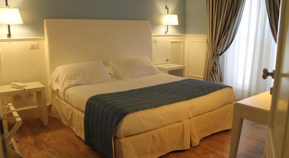 Premium bedding, free minibar items, in-room safe