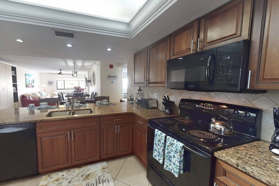 Large updated kitchen with plenty of space and all large appliances included.  Basic appliances, dishes, silverware etc. are all included.
