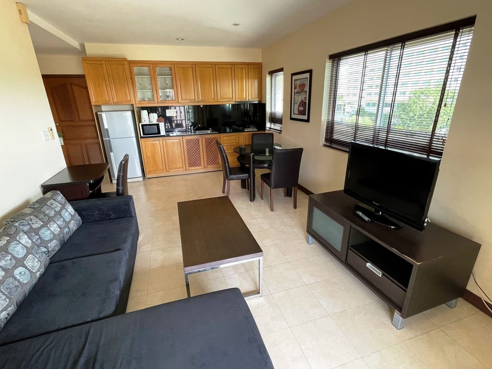Superior Apartment, 1 Bedroom | Living area | Flat-screen TV