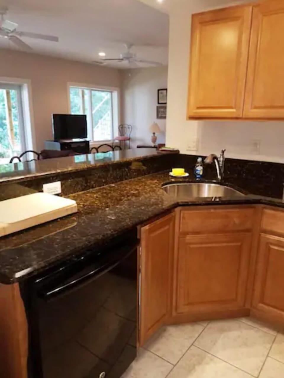 Dishwasher, smooth top stove, refrigerator,  maple cabinetry,  granite counters 