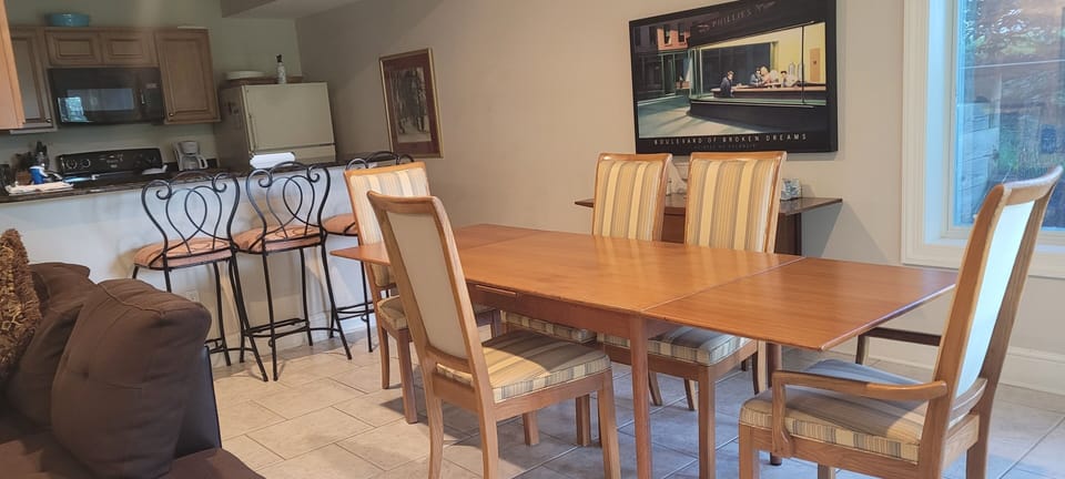 Dining table expands to seat 10. Great for puzzles and board games.