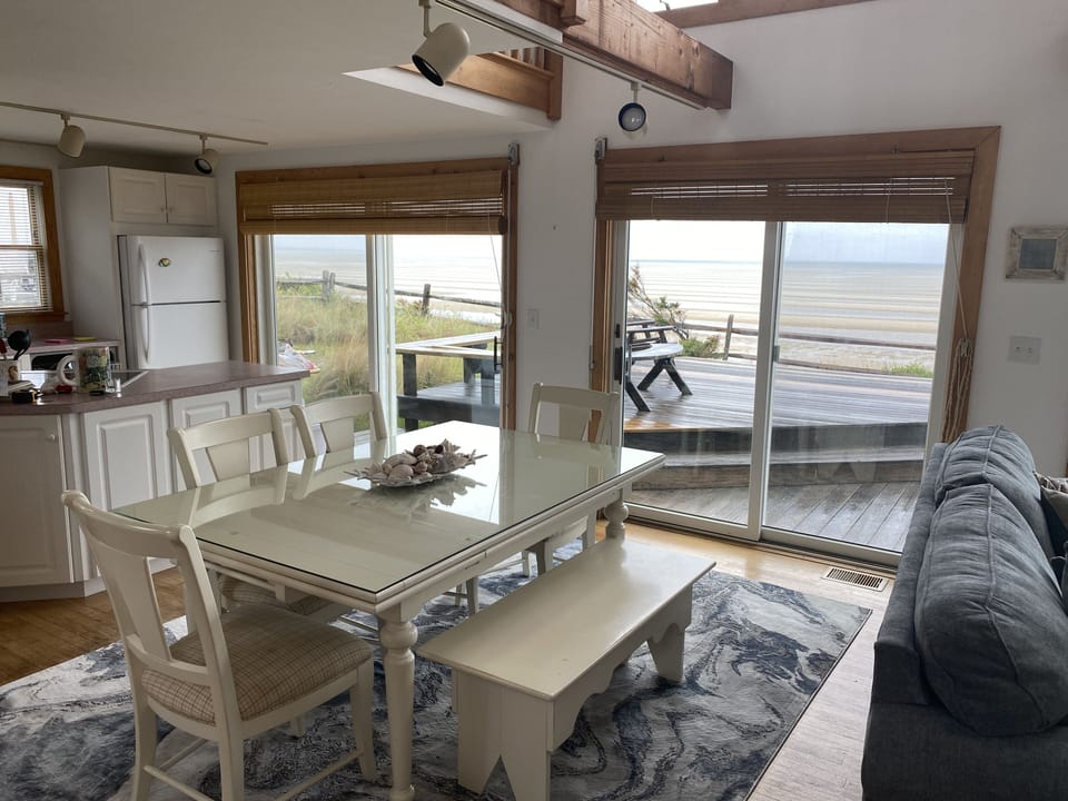 Dining room area with seating for 6 and views of the ocean