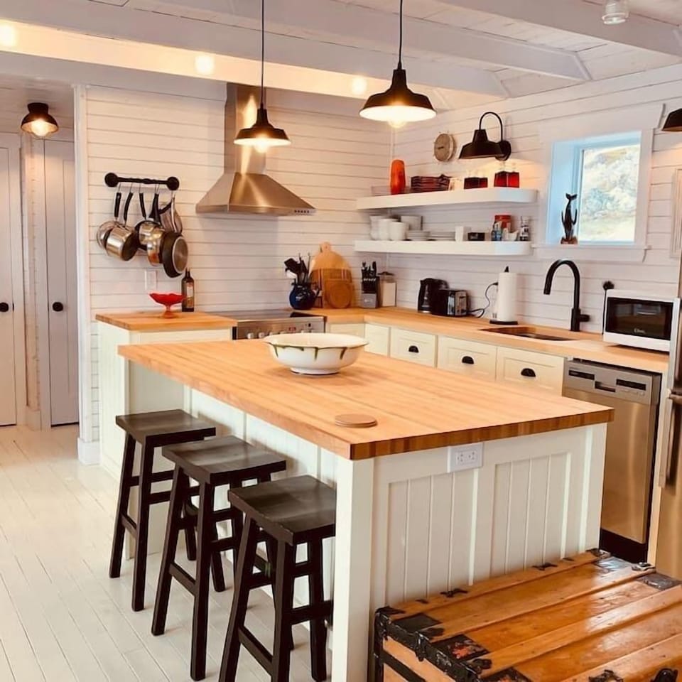 Look out at the ocean while you cook up a feast from this beautifully renovated, open-concept kitchen.
