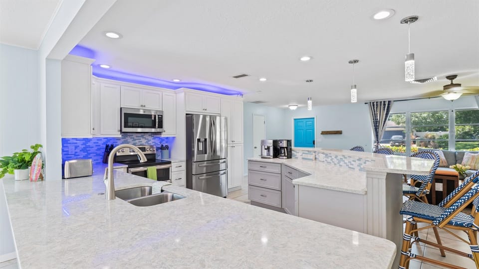 Our kitchen has an open floorplan, spilling out into the living room and dining area