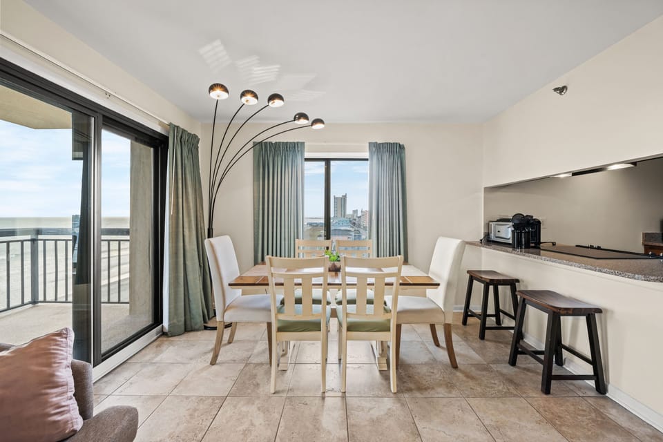 This bright and sunny room allows everyone to enjoy a meal together.