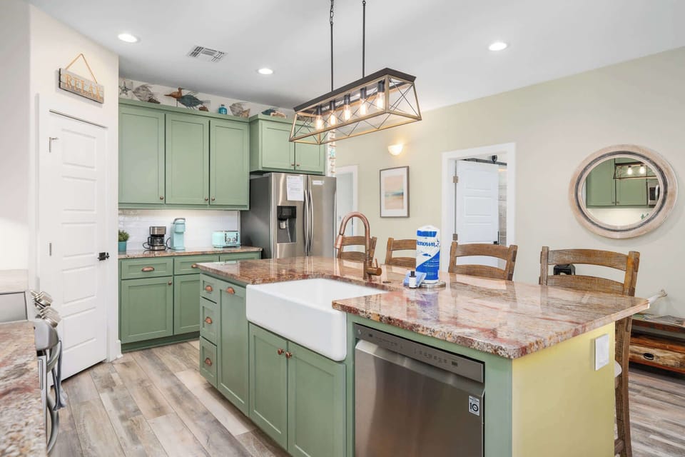 Our fully stocked kitchen has everything you need to whip up delicious meals—from high-end appliances and ample cookware to generous cabinetry and countertop space.