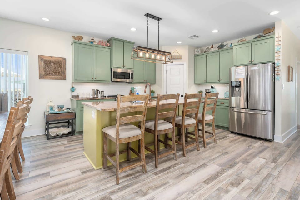 Our fully stocked kitchen has everything you need to whip up delicious meals—from high-end appliances and ample cookware to generous cabinetry and countertop space.