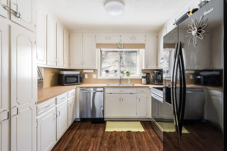 Bright, sunny kitchen. This refrigerator has been replaced.