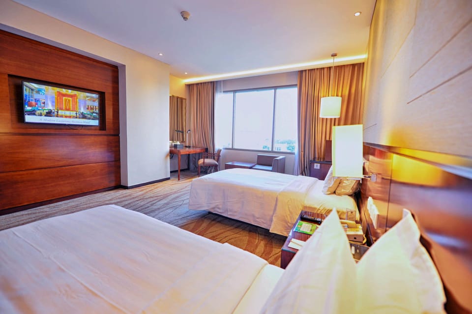 New Deluxe Twin | Premium bedding, in-room safe, desk, WiFi (free)